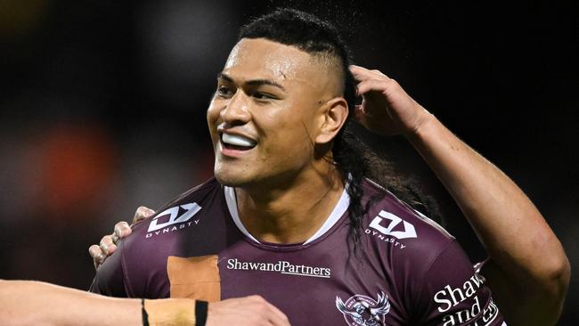 WOLLONGONG, AUSTRALIA - JULY 29: Haumole Olakau'atu of the Manly Sea Eagles celebrates scoring a try during the round 22 NRL match between St George Illawarra Dragons and Manly Sea Eagles at WIN Stadium on July 29, 2023 in Wollongong, Australia. (Photo by Izhar Khan/Getty Images)