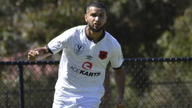 Redouane Sarakh celebrates a goal for North Sunshine Eagles.