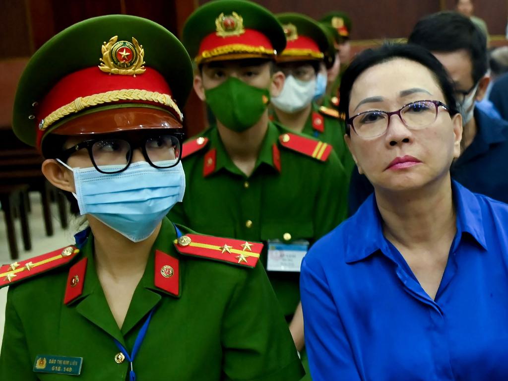 Truong My Lan, right, has been sentenced to death. Picture: AFP