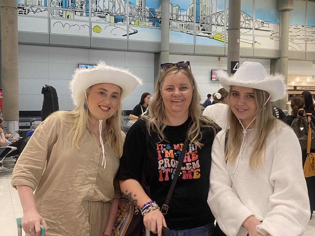 Taylor Swift fans at Brisbane Airport ready to jet off to Sydney to see their idol perform. Picture: Rose Innes