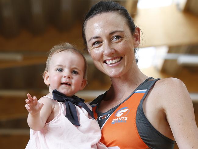 NSW Swift's Netballer Bec Bulley pictured with daughter Indie who will travel with her in the new netball league.