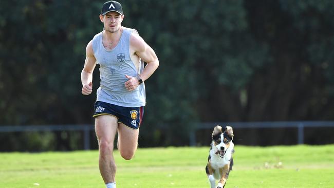 Lachie Neale’s favourite Christmas gift is a man’s best friend. Picture: AAP / Darren England