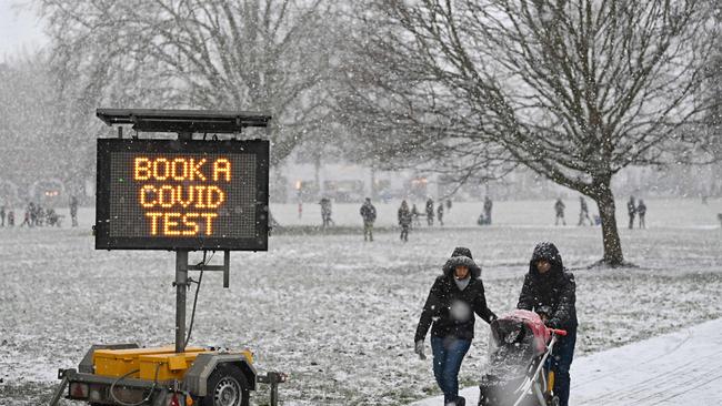 A sign advising people to get a COVID-19 test in west London. Picture: AFP.