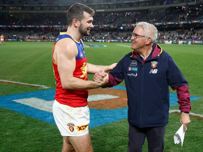 Conor McKenna (left) is congratulated by Brisbane Lions coach Chris Fagan. Picture: Michael Willson/AFL Photos via Getty Images