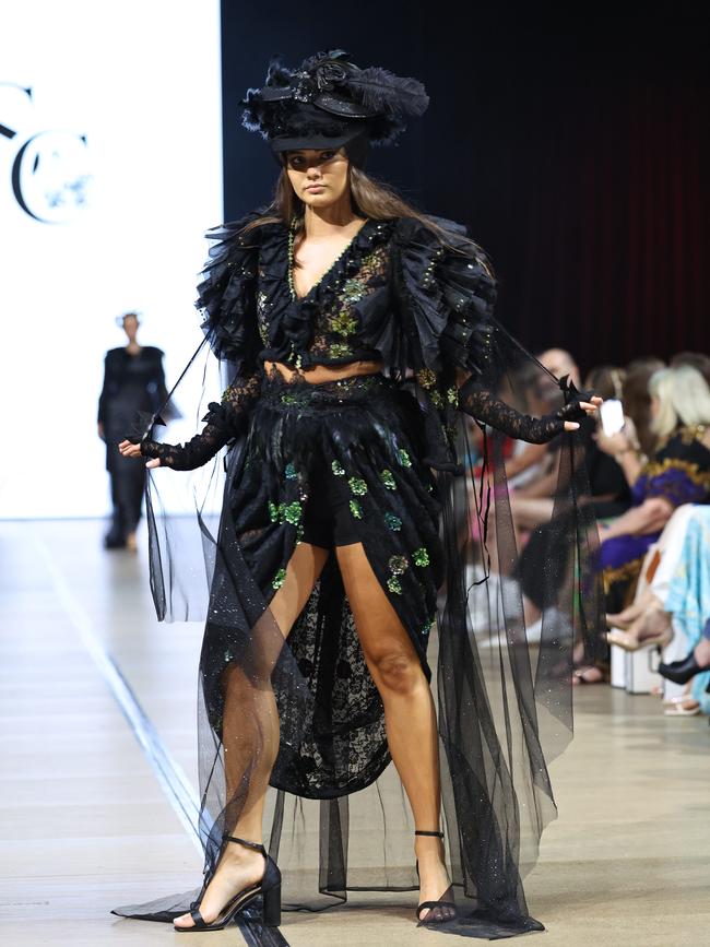 Model Sophie Barnes wears couture by Stelly Currie Designs on the first night's runway show at Cairns Fashion Week, held at the Screen Queensland studios. Picture: Brendan Radke