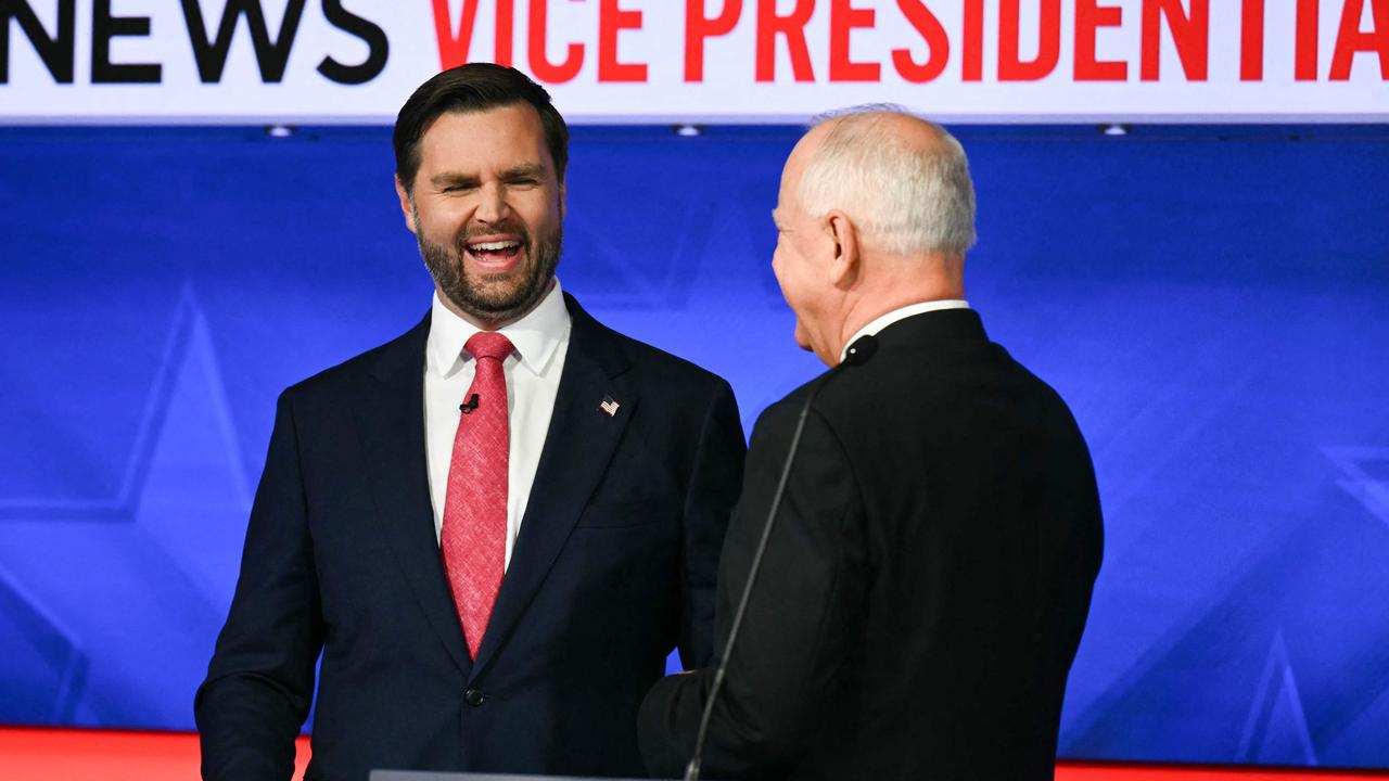 US Senator and Republican vice presidential candidate JD Vance (L) and Minnesota Governor and Democratic vice presidential candidate Tim Walz. Picture: ANGELA WEISS / AFP