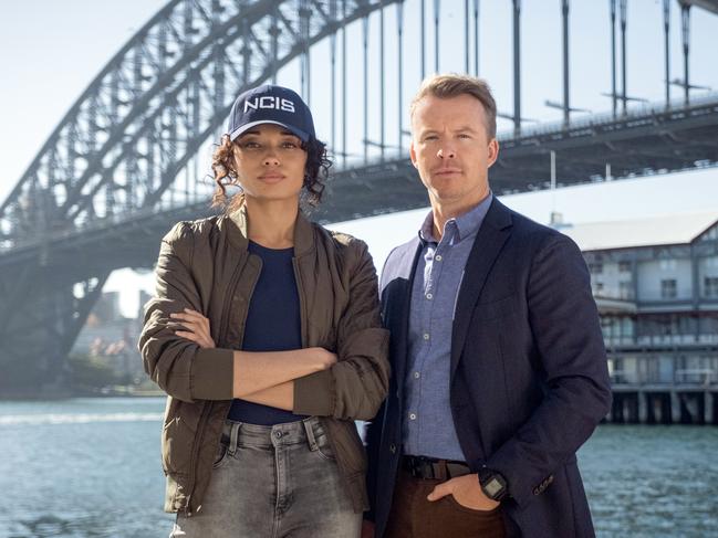 L-R: Olivia Swann as NCIS Special Agent Captain Michelle Mackey and Todd Lasance as AFP Liaison Officer Sergeant Jim  'JD' Dempsey in NCIS: Sydney, episode 1, season 1, streaming on Paramount+, 2023. Photo Credit: Daniel Asher Smith/Paramount+