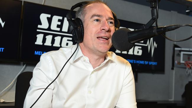 Sports commentator Gerard Whateley broadcasting at the SEN studio. Picture: Josie Hayden