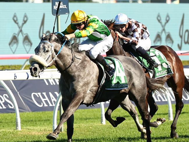 SYDNEY, AUSTRALIA - APRIL 06: Damian Lane riding Chain Of Lightning wins Race 7 James Squire T J Smith Stakes during Sydney Racing at Royal Randwick Racecourse on April 06, 2024 in Sydney, Australia. (Photo by Jeremy Ng/Getty Images)