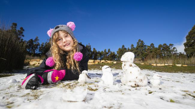 Isabella Braham, 7 enjoying the snow on Mt Wellington / kunanyi. Cold weather and snow in Hobart. Picture: Richard Jupe