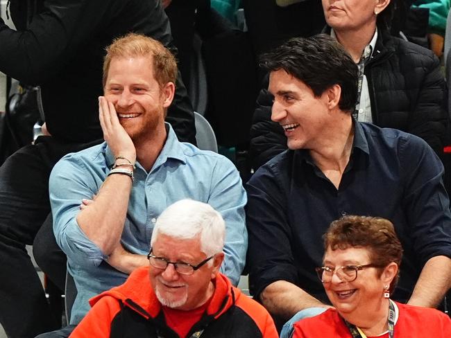 Prince Harry and Canadian PM Justin Trudeau spotting laughing together at an Invictus Games event in Vancouver. Picture: PA Images via Getty Images