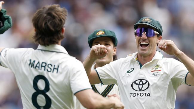 MELBOURNE, AUSTRALIA - DECEMBER 30: Mitchell Marsh of Australia celebrates with teammates after taking a tach to dismiss Rishabh Pant of India during day five of the Men's Fourth Test Match in the series between Australia and India at Melbourne Cricket Ground on December 30, 2024 in Melbourne, Australia. (Photo by Daniel Pockett - CA/Cricket Australia via Getty Images)