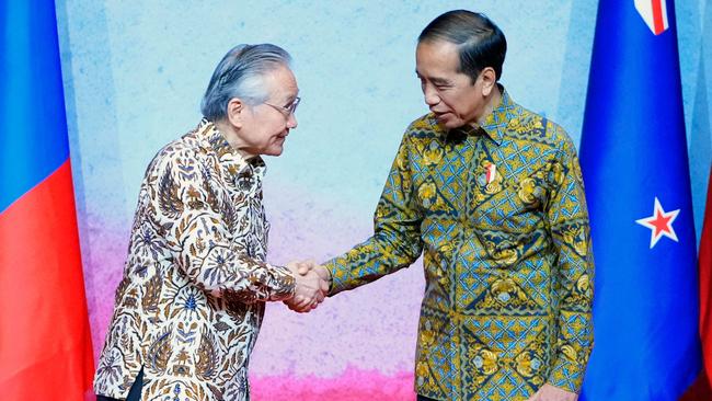 Indonesian President Joko Widodo, right, welcomes Thailand Foreign Minister Don Pramudwinai at the Association of Southeast Asian Nations (ASEAN) foreign ministers meeting in Jakarta on Friday. Picture: AFP