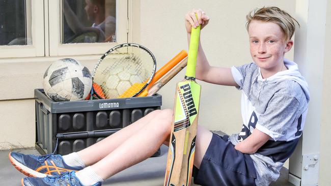 From cricket to creative writing, swimming to soccer, 11-year-old Hamish does it all. And he does it with just one arm. Picture: Tim Carrafa