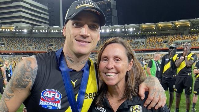 Tigers player Dustin Martin with Richmond’s sports psychologist Emma Murray.