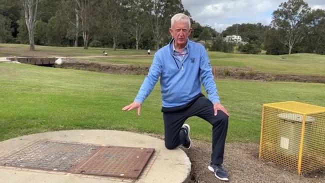 Meadowbrook Golf director Tom Linskey shows one of the sewer drains that took the council more than five years to install. Picture: Judith Kerr