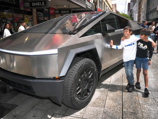 Tesla cybertruck in Rundle Mall - The Tesla prototype got the attention of cousins (L) Tyrell Karpany,9, and Jaxon Papertalk,8, both of Largs North. 18 October 2024. Picture Dean Martin