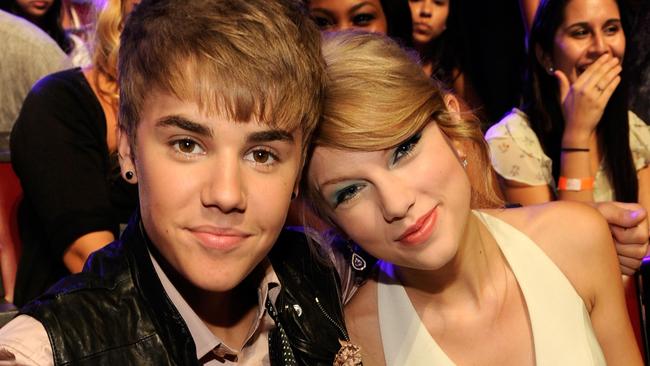 Justin Bieber with Taylor Swift at an awards ceremony in 2011; the two are now at loggerheads. Picture: Kevin Mazur/TCA.