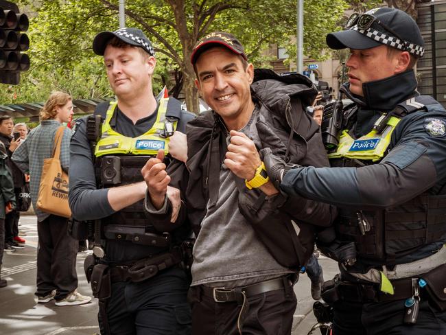 Police detain a protester during the pro-Palestine rally in Melbourne. Picture: Tamati Smith