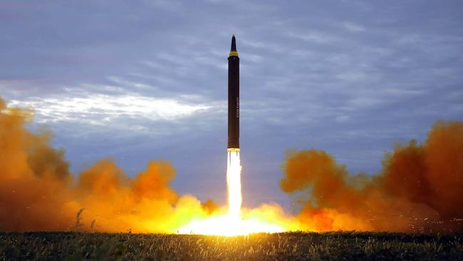 North Korea's intermediate-range strategic ballistic rocket Hwasong-12 lifting off from the launching pad at an undisclosed location near Pyongyang. Picture: AFP