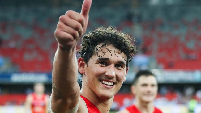 Wil Powell acknowledges the crowd after the Suns’ victory at Metricon Stadium. Picture: AFL Photos via Getty Images