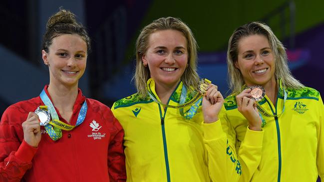 McIntosh (L) with Titmus (C) and bronze medallist Kiah Melverton on the podium at the Commonwealth Games. Picture: AFP