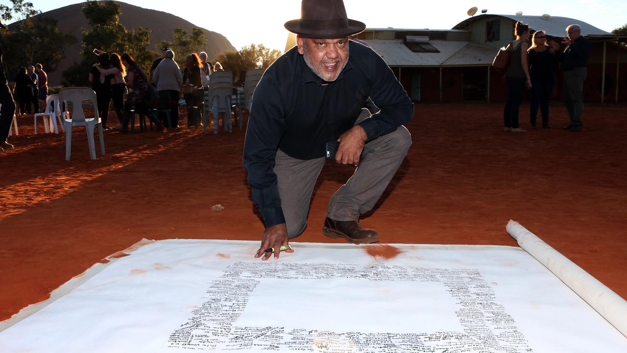 Indigenous activist Noel Pearson signs the Uluru Statement From the Heart. Picture: James Croucher