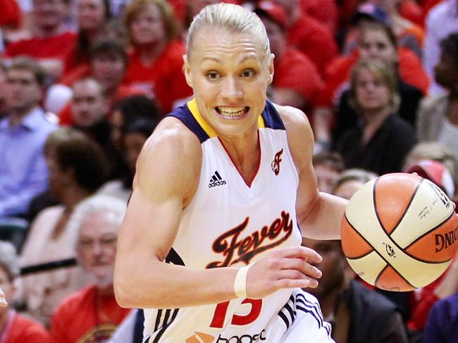 INDIANAPOLIS, IN - OCTOBER 19: Erin Phillips #13 of the Indiana Fever dribbles past Seimone Augustus #33 of the Minnesota Lynx during Game Three of the 2012 WNBA Finals on October 19, 2012 at Bankers Life Fieldhouse in Indianapolis, Indiana. NOTE TO USER: User expressly acknowledges and agrees that, by downloading and or using this Photograph, user is consenting to the terms and conditions of the Getty Images License Agreement. Michael Hickey/Getty Images/AFP== FOR NEWSPAPERS, INTERNET, TELCOS & TELEVISION USE ONLY ==