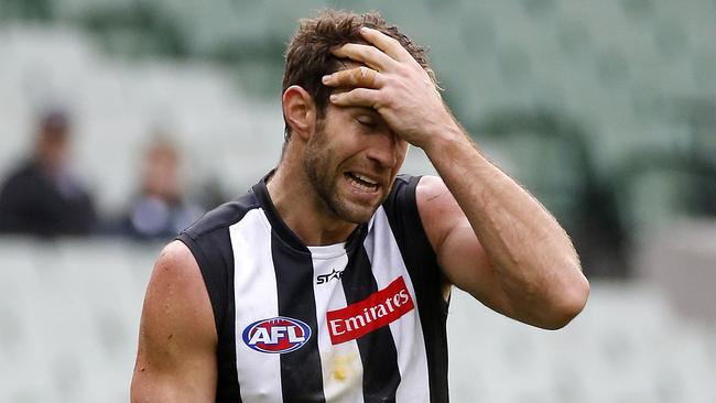 Travis Cloke lets a mark slip through his hands. Picture: George Salpigtidis