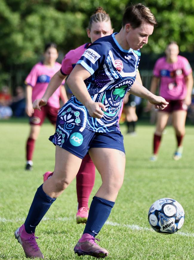 Action between Estates FC and MA Olympic.