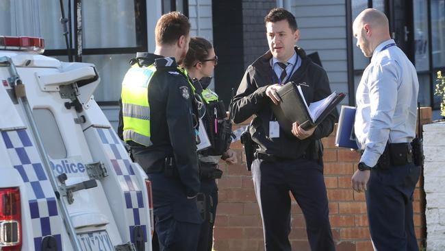 Police outside a home that was sprayed with bullets in a drive-by shooting in Edithvale. Picture: David Crosling