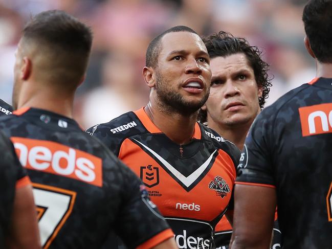 SYDNEY, AUSTRALIA - APRIL 25:  Moses Mbye of the Tigers and team mates look dejected after a Sea Eagles try during the round seven NRL match between the Wests Tigers and the Manly Sea Eagles at Bankwest Stadium, on April 25, 2021, in Sydney, Australia. (Photo by Matt King/Getty Images)