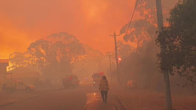 Former PM Tony Abbott joined in the fight to save homes, in “terrible condition” at Bendalong and Manyana. Picture: Ingleside RFS