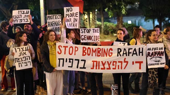 Demonstrators gather with signs during a protest by Israeli activists against the war in the Gaza Strip and the planned ground operation in Rafah. Picture: AFP