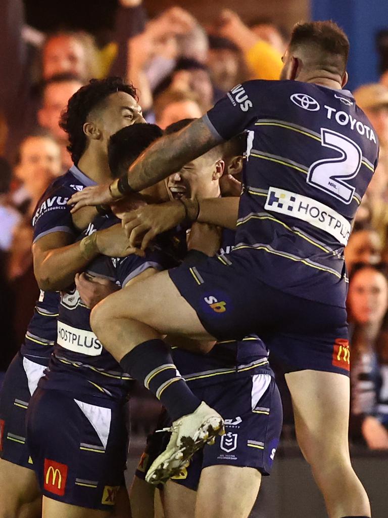 Celebrations after Valentine Holmes kicked the winning field goal. Picture: Mark Metcalfe/Getty Images)