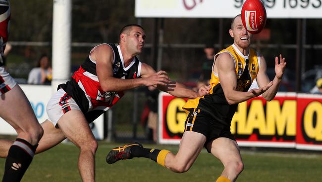 Anthony Bruhn (right) has left Frankston YCW, making Collegians his home club. Picture: Mark Dadswell