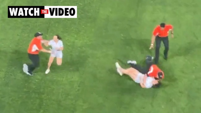 Female pitch invader brutally tackled - ‘Is she out?’