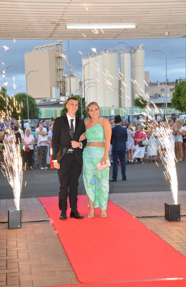 Toowoomba school formals. At the 2023 St Ursula's College formal is graduate Emily Dolley with her partner. Picture: Rhylea Millar