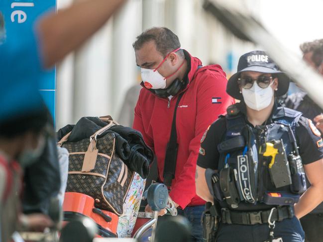 Arrivals from Covid 19 hotspots at Darwin International Airport enrolee to mandatory Quarantine as Borders open to Interstate visitors.Picture GLENN CAMPBELL