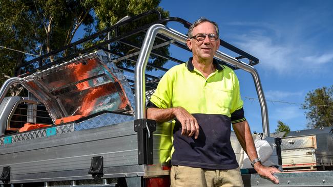 Builder John Atkins with his new ute that has lockable draws and containers for his tools. Picture: Penny Stephens