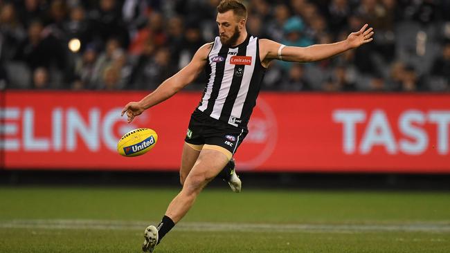 Lynden Dunn was a key member of the Pies’ defence before injury cruelled him. Picture: AP