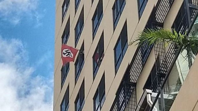 The flag flying out the window in Margaret St in Brisbane last month.