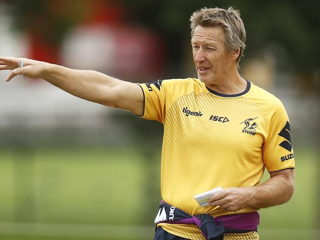 MELBOURNE, AUSTRALIA - MARCH 18: Storm head coach Craig Bellamy (L) in action during a Melbourne Storm NRL training session at Gosch's Paddock on March 18, 2020 in Melbourne, Australia. (Photo by Daniel Pockett/Getty Images)