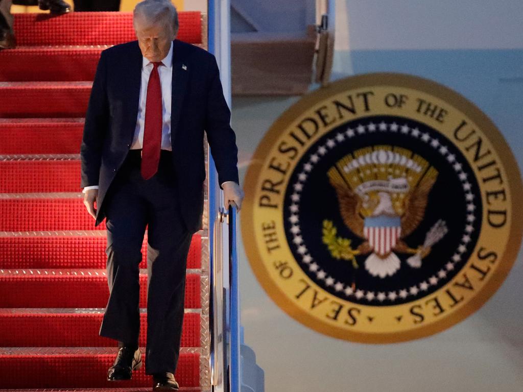 President Donald Trump walks down the stairs of Air Force One upon his arrival at Joint Base Andrews. Picture: AP
