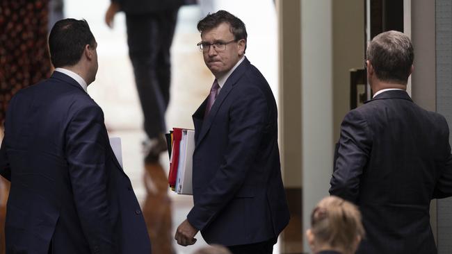 Education Minister Alan Tudge, centre, will tell academics the current model, where an average 25 per cent of revenue relied on international students, is not sustainable beyond the pandemic. Picture: Gary Ramage