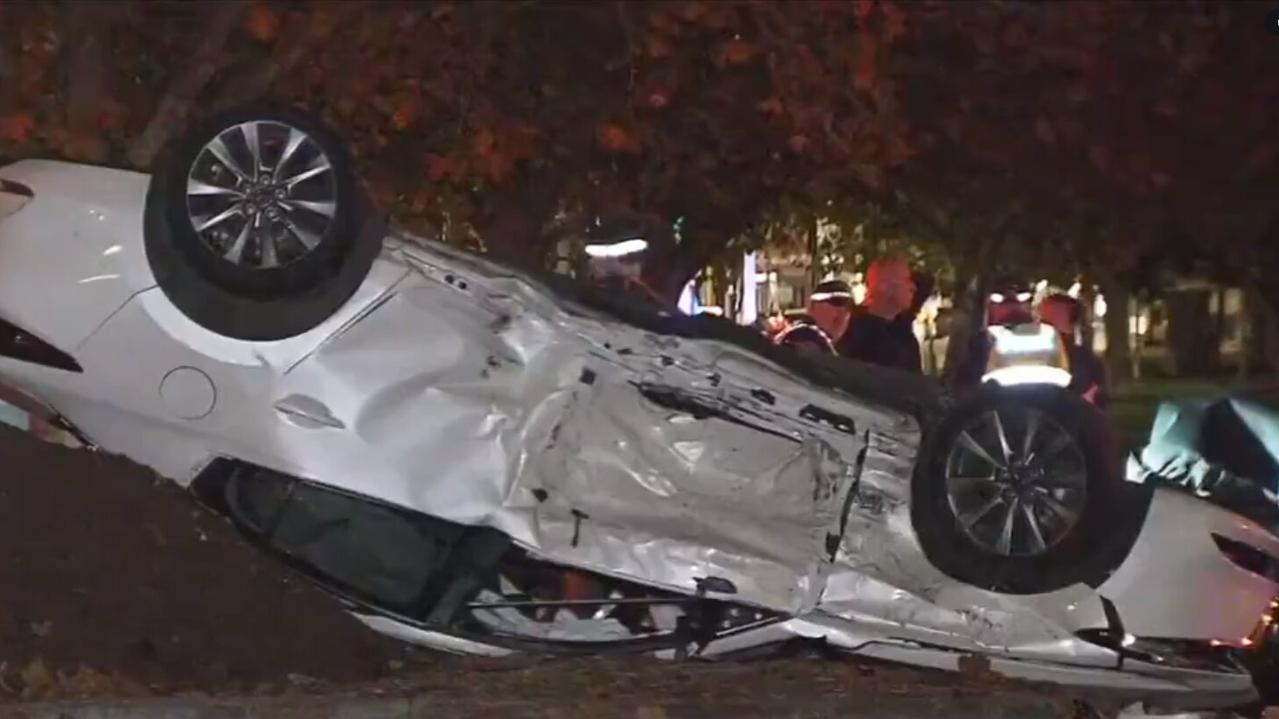 The car the girls were travelling in was flipped onto its roof in the collision. Picture: 7NEWS