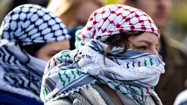 Pro-Palestinian protests featuring masked individuals spewing hate speech and waving the flags of proscribed terrorist groups, have attracted no charges from state or federal police. Picture: George Calvelo/Getty Images