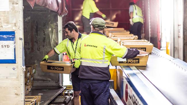 Qantas Freight loading cargo at Sydney Airport. Supplied