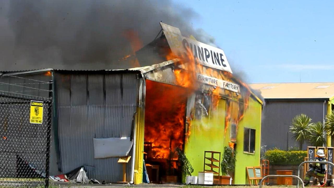 A fire which destroyed part of the Sunpine Furniture showroom and office on Anzac Ave in 2014. Picture: Contributed