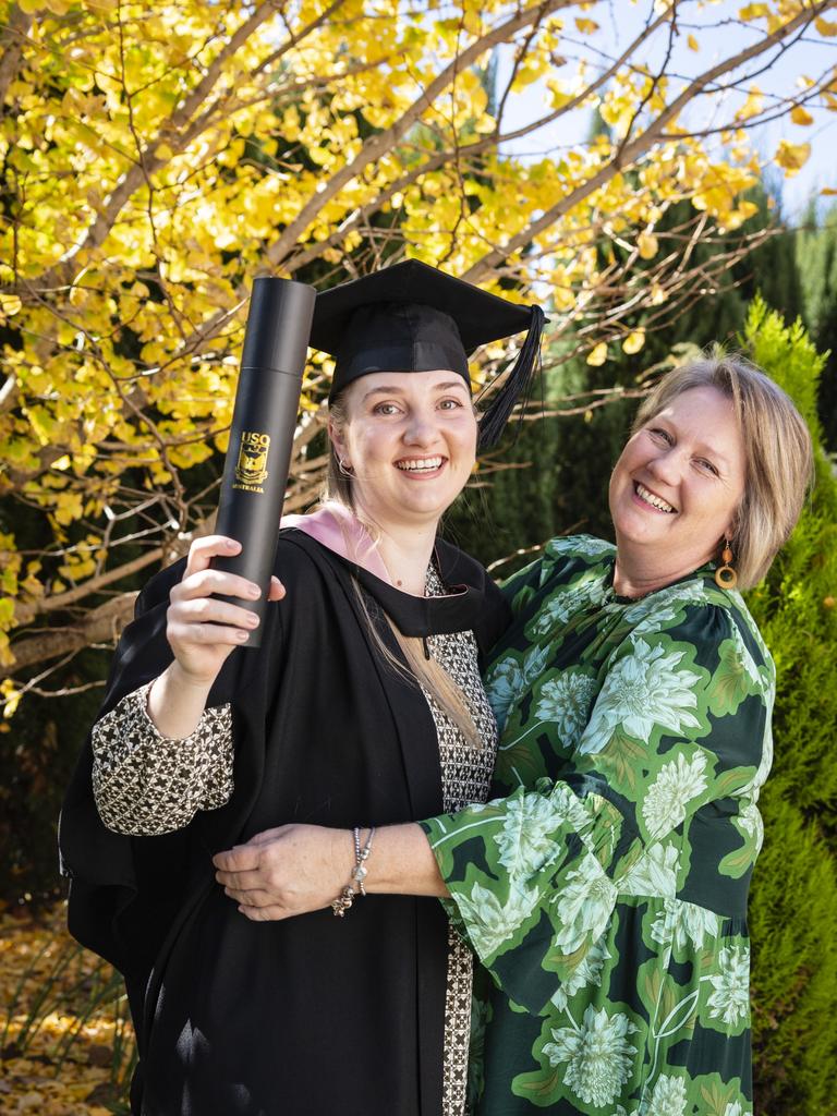 Bachelor of Education (Primary) graduate Courtney Sippel is congratulated by mum Debbie Walker at UniSQ graduation ceremony at Empire Theatres, Tuesday, June 27, 2023. Picture: Kevin Farmer